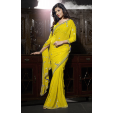 Magnificent Stone Worked Yellow Colored Wedding Wear Chiffon Saree